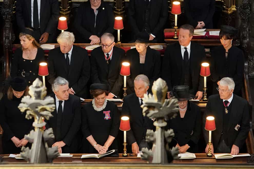 (top row left to right): Carrie Johnson, Boris Johnson, Philip May, Theresa May, David Cameron, Samantha Cameron, (bottom row left to right) Sarah Brown, Gordon Brown, Cherie Blair, Sir Tony Blair, Lady Norma Major and Sir John Major, at the state funeral of the Queen (Gareth Fuller/PA)