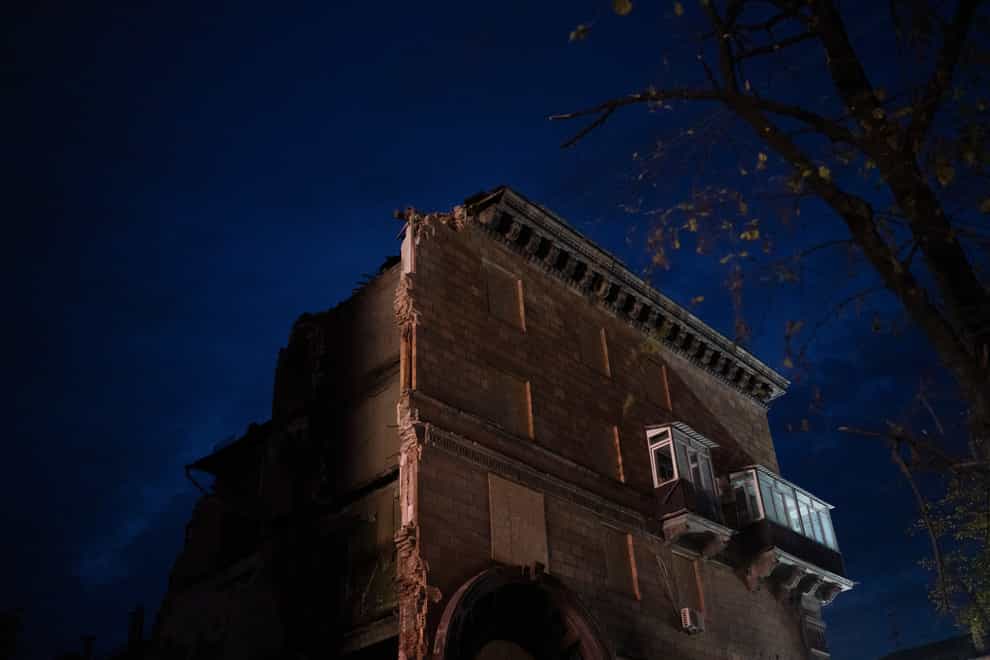 A building previously damaged by a Russian attack is seen in Zaporizhzhia, Ukraine (Leo Correa/AP)
