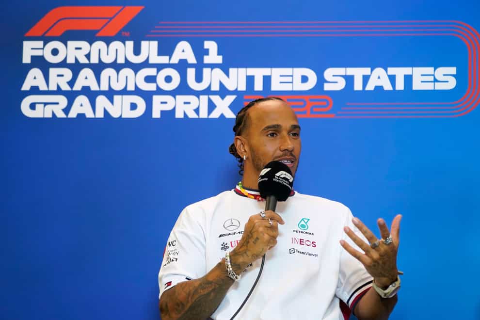 Mercedes driver Lewis Hamilton, of Britain, speaks during a news conference at the Formula One U.S. Grand Prix auto race at Circuit of the Americas, Thursday, Oct. 20, 2022, in Austin, Texas. (AP Photo/Charlie Neibergall)
