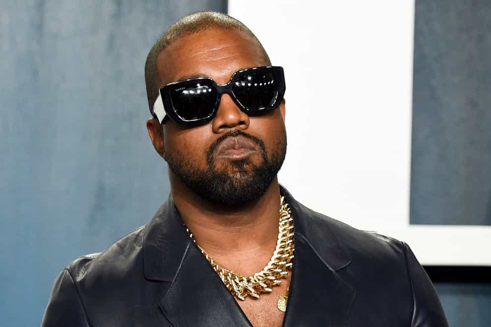 Kanye West arrives at the Vanity Fair Oscar Party (Evan Agostini/Invision/AP)