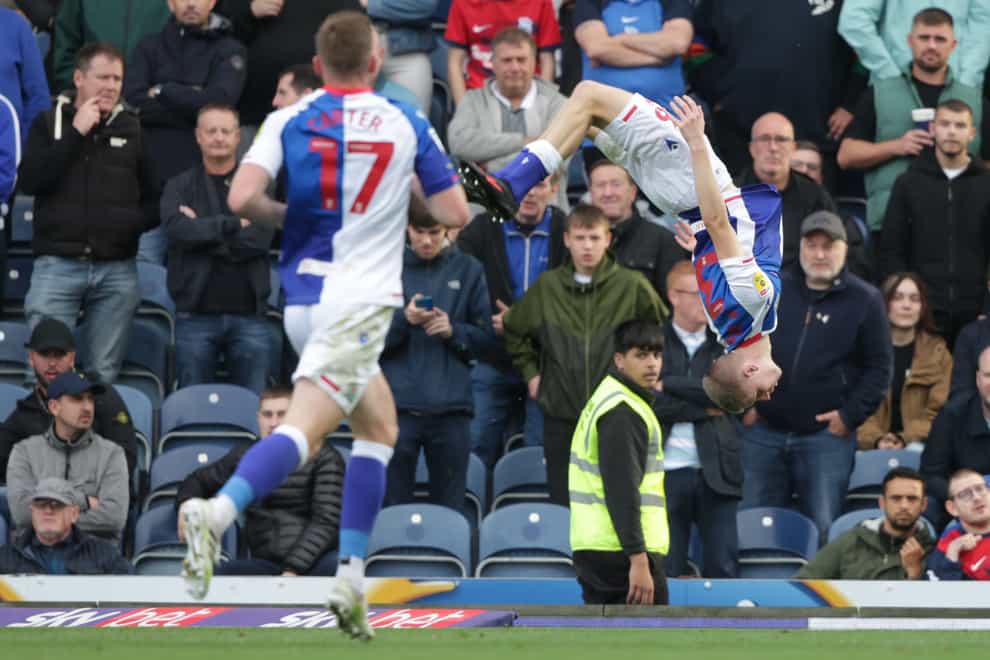 Adam Wharton celebrates scoring Blackburn’s second goal in a 2-1 over Birmingham with a somersault (Ian Hodgson/PA Images).