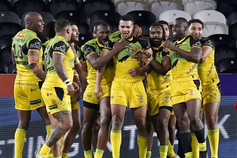 Jamaica’s Ben Jones-Bishop (centre) celebrates with team-mates (Danny Lawson/PA)