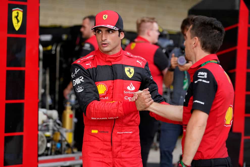 Ferrari driver Carlos Sainz (centre) took pole position for the United States Grand Prix after beating team-mate Charles Leclerc to top spot by 0.065 seconds (Darron Cummings/AP)