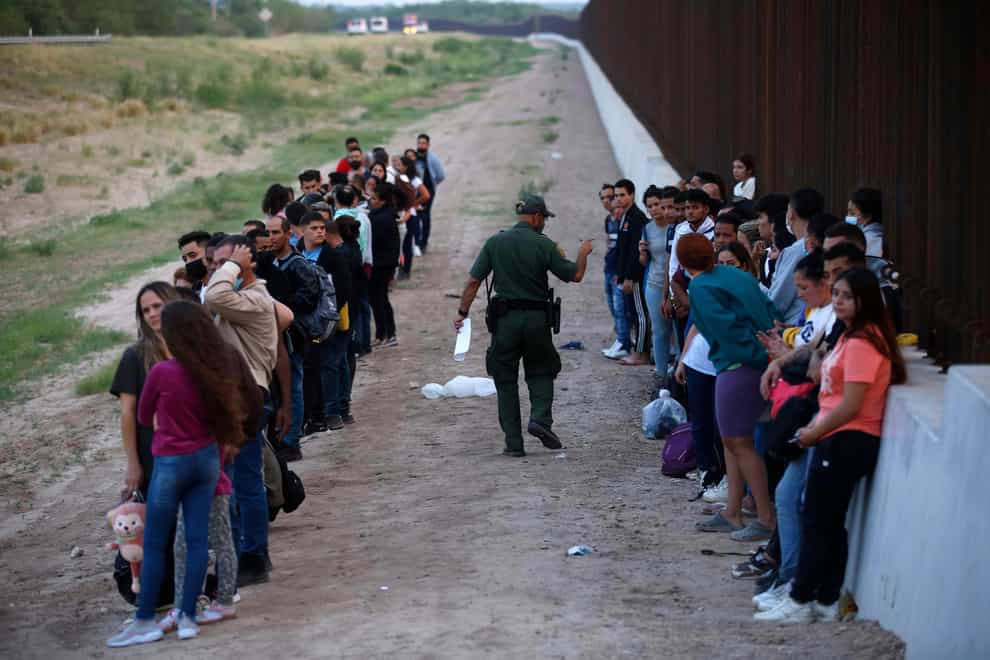 A surge in migration from Venezuela, Cuba and Nicaragua in September brought the number of illegal crossings to the US to the highest level recorded in a fiscal year (Dario Lopez-Mills/AP)