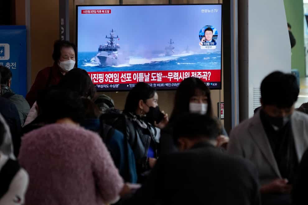North and South Korea say they have exchanged warning shots along their disputed western sea boundary (Ahn Young-joon/AP)