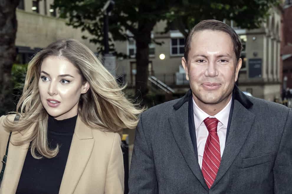 James Stunt, ex-husband of Formula One heiress Petra Ecclestone, leaves Cloth Hall Court in Leeds with Helena Robinson, where he is trial for money laundering charges with seven other defendants (PA)