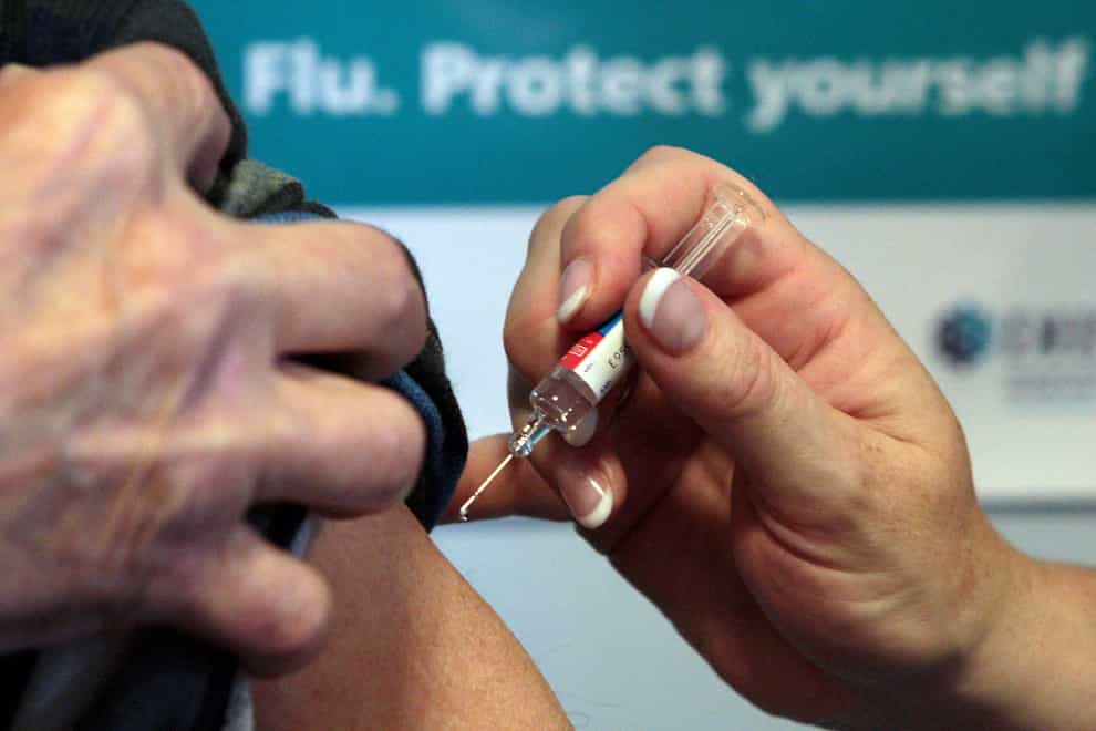 File photo of a patient receiving the seasonal flu vaccine (David Cheskin/PA)