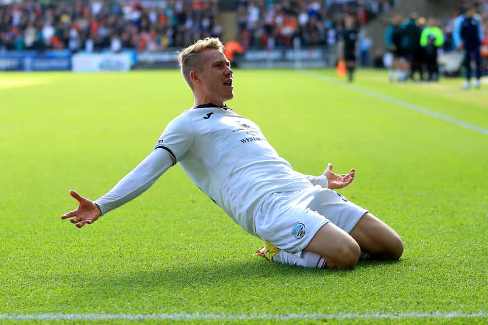 Swansea midfielder Ollie Cooper has extended his stay at the Sky Bet Championship club until 2027 (Bradley Collyer/PA)