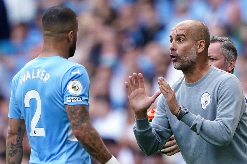 Pep Guardiola (right) said he hopes Kyle Walker will be fit in time for the World Cup (Zac Goodwin/PA)