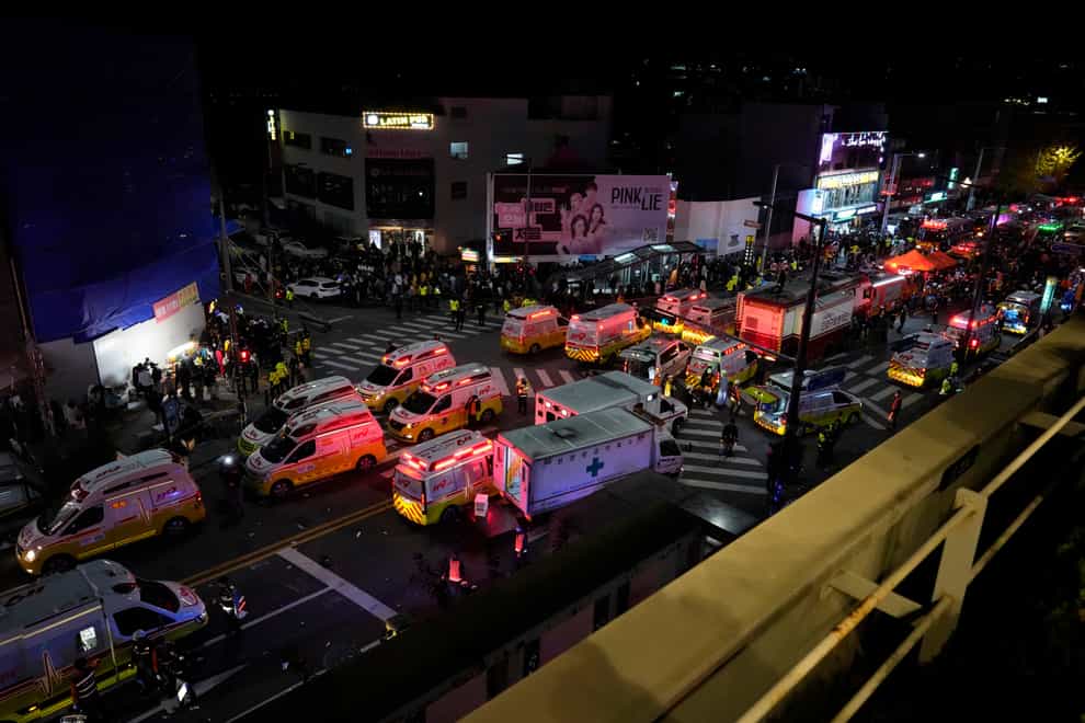 Ambulances and rescue workers arrive at the street near the scene in Seoul, South Korea (Lee Jin-man/AP)