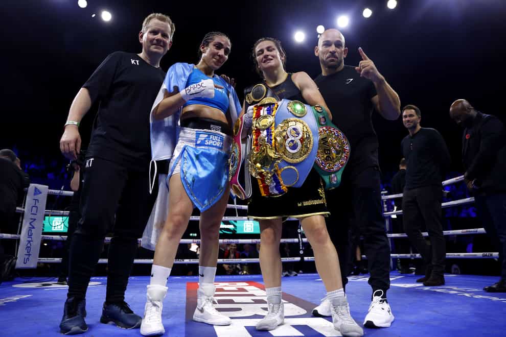 Katie Taylor, right, outclassed Argentina’s Karen Elizabeth Carabajal to retain her undisputed world lightweight titles (Steve Paston/PA)