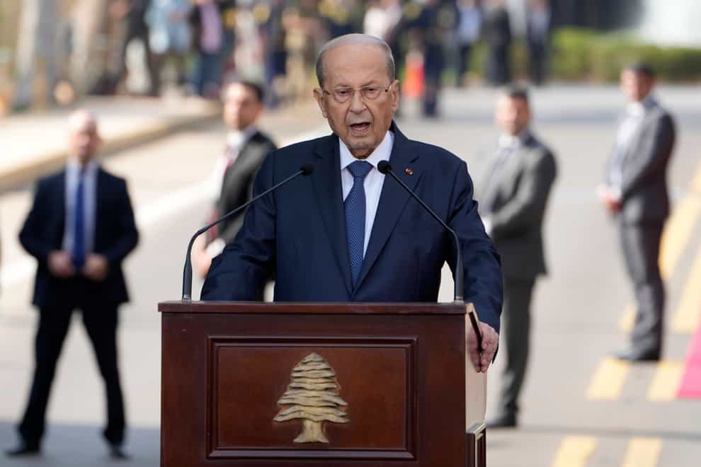 Lebanese President Michel Aoun delivers a speech to his supporters gathered outside the presidential palace in Baabda, east of Beirut, Lebanon (Bilal Hussein/PA)