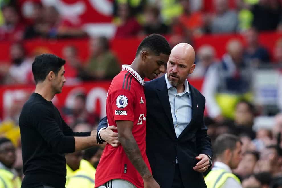Manchester United manager Erik ten Hag embraces Marcus Rashford after he is substituted during the Premier League match at Old Trafford, Manchester. Picture date: Sunday September 4, 2022.