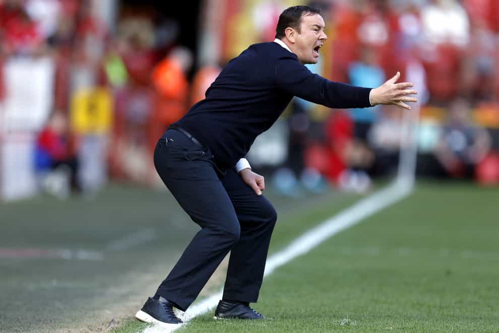 Morecambe manager Derek Adams will have his options boosted by players returning from suspension against Derby (Steven Paston/PA)