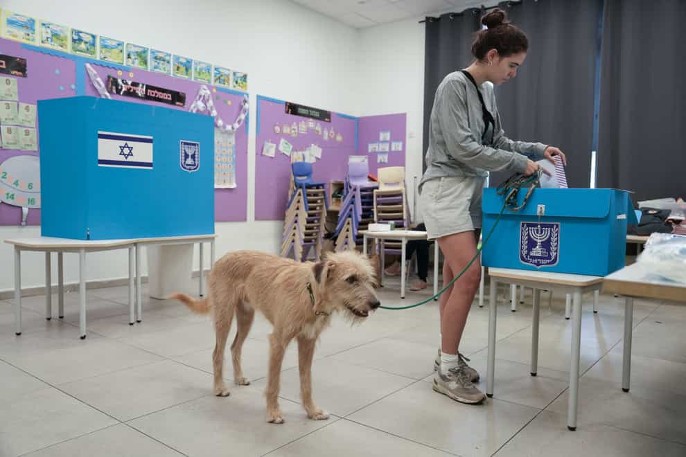A woman votes during the Israeli election (Oded Balilty/AP)