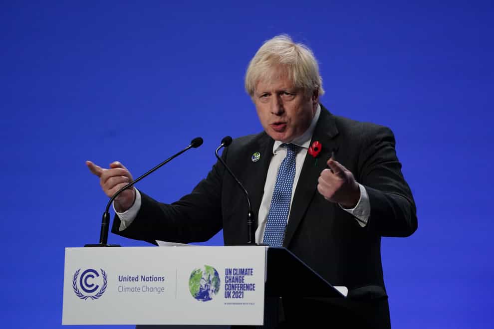 Prime Minister Boris Johnson holds a press conference at the Cop26 (Jane Barlow/PA)