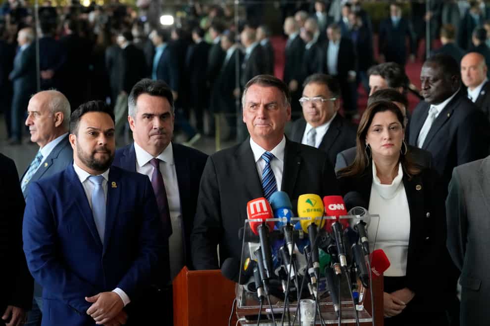 Brazilian President Jair Bolsonaro speaks from his official residence of Alvorada Palace in Brasilia, Brazil, Tuesday, Nov. 1, 2022, the leader’s first public comments since losing the October 30 presidential runoff (Eraldo Peres/AP/PA)