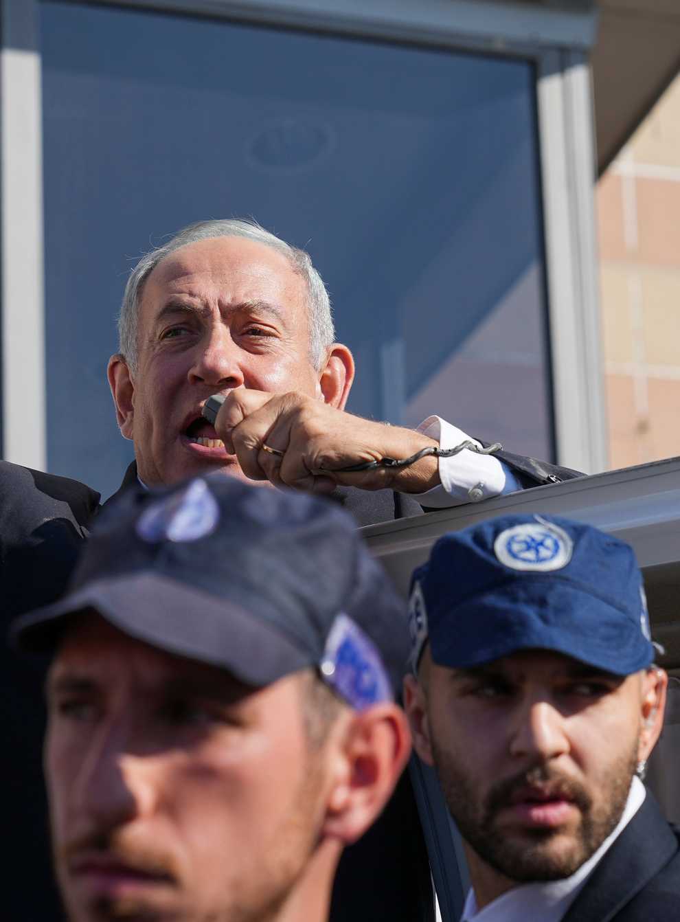 Benjamin Netanyahu, former Israeli Prime Minister and the head of Likud party, waves to his supporters during a national election, in Ashkelon, Israel, Tuesday, Nov. 1, 2022. (AP Photo/Tsafrir Abayov)