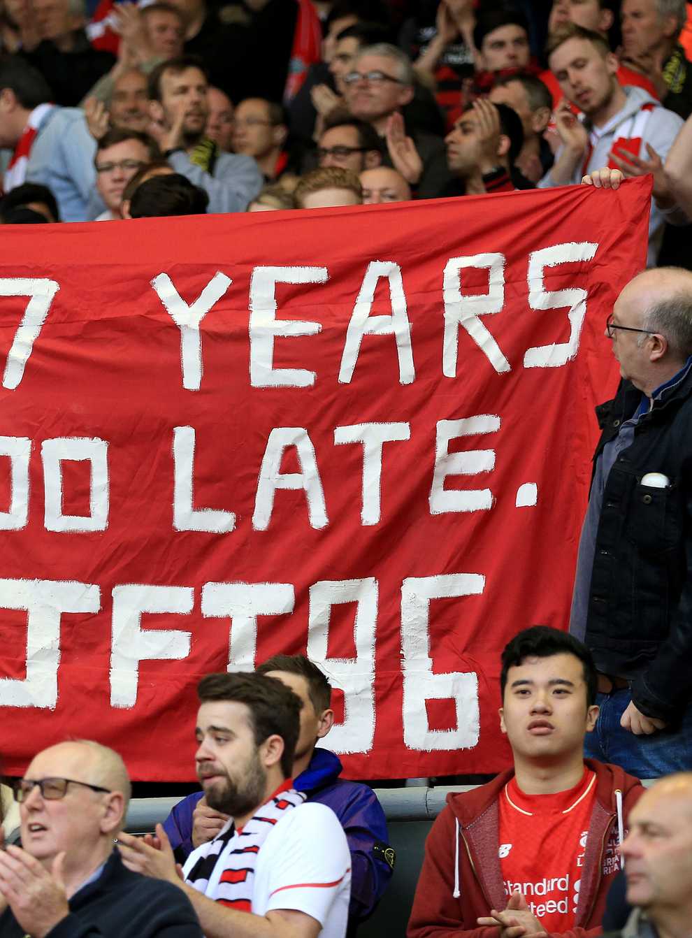 Liverpool fans hold up a banner in memory of the victims of the 1989 Hillsborough disaster (Nigel French/PA)