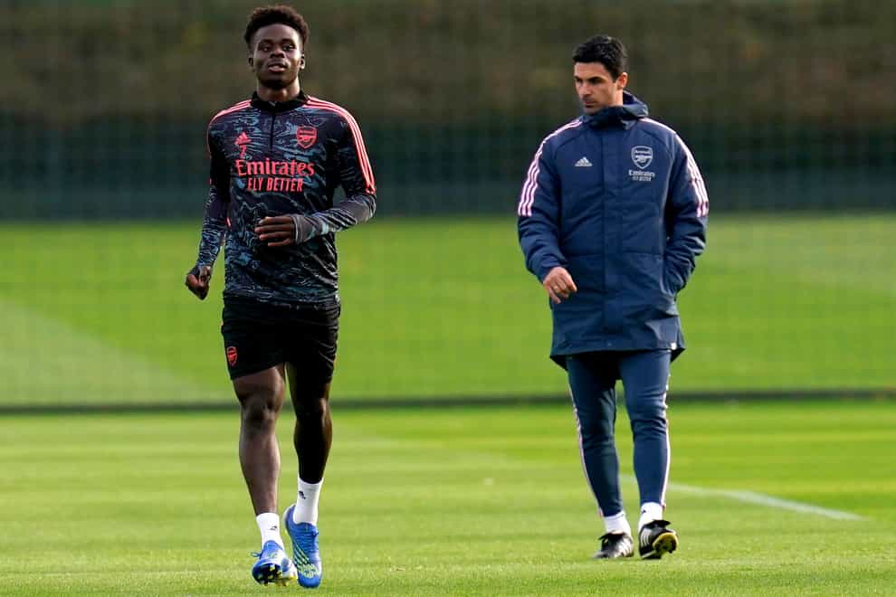 Arsenal manager Mikel Arteta (right) has revealed Bukayo Saka could play against FC Zurich (John Walton/PA)