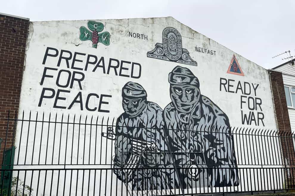 A mural to the Ulster loyalist paramilitary group the Ulster Volunteer Force on wall at the entrance of Mount Vernon housing estate in north Belfast with the text, ‘Prepared for peace, ready for war’ (PA)