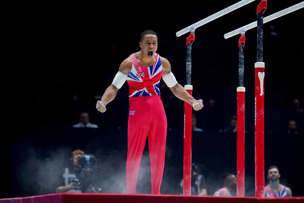 Joe Fraser starred as Great Britain grabbed a bronze medal at the World Gymnastics Championships (Peter Byrne/PA)