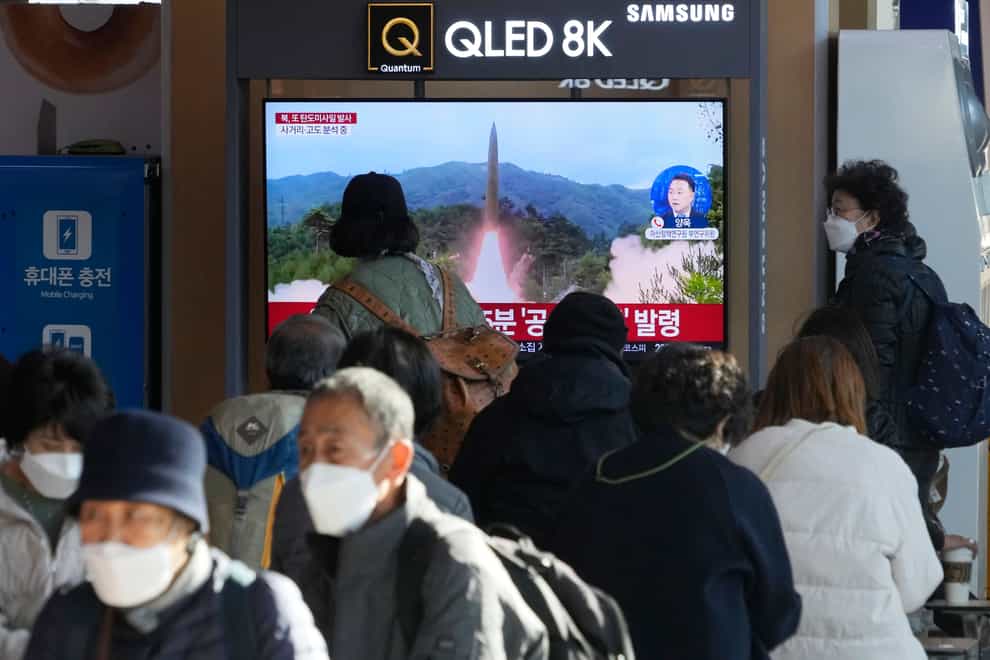 A TV screen shows a file image of North Korea’s missile launch during a news program at the Seoul Railway Station in Seoul, South Korea, Wednesday, Nov. 2, 2022. South Korea says it has issued an air raid alert for residents on an island off its eastern coast after North Korea fired a few missiles toward the sea (Ahn Young-joon/AP/PA)
