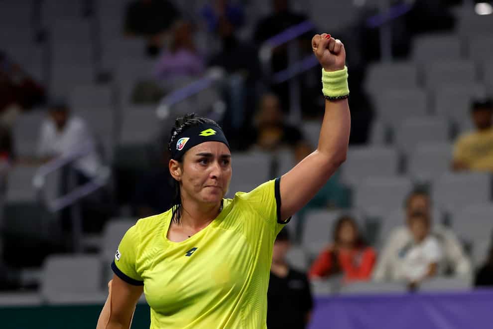 World number two Ons Jabeur has recovered from an upset to become the first Tunisian to win a WTA Finals match (Tim Heitman/AP)