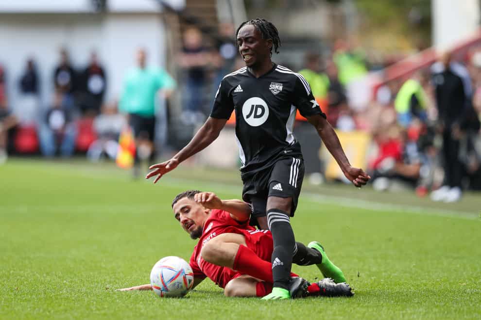 Manny Brown (right) in action for Sidemen FC (Kieran Cleeves/PA)