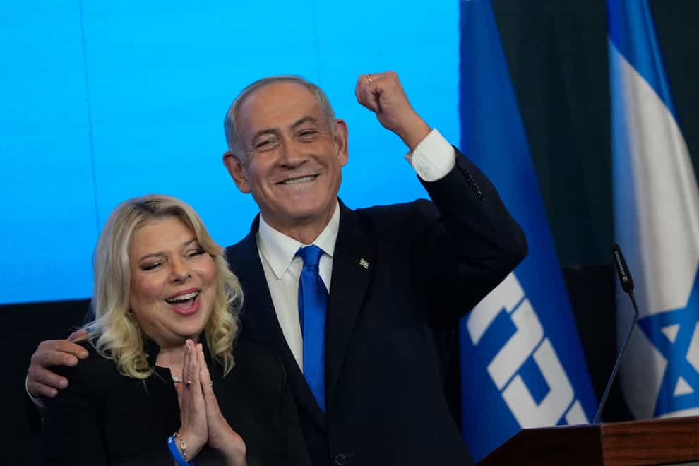 Benjamin Netanyahu and his wife Sara after the first exit poll results (Tsafrir Abayov/AP)