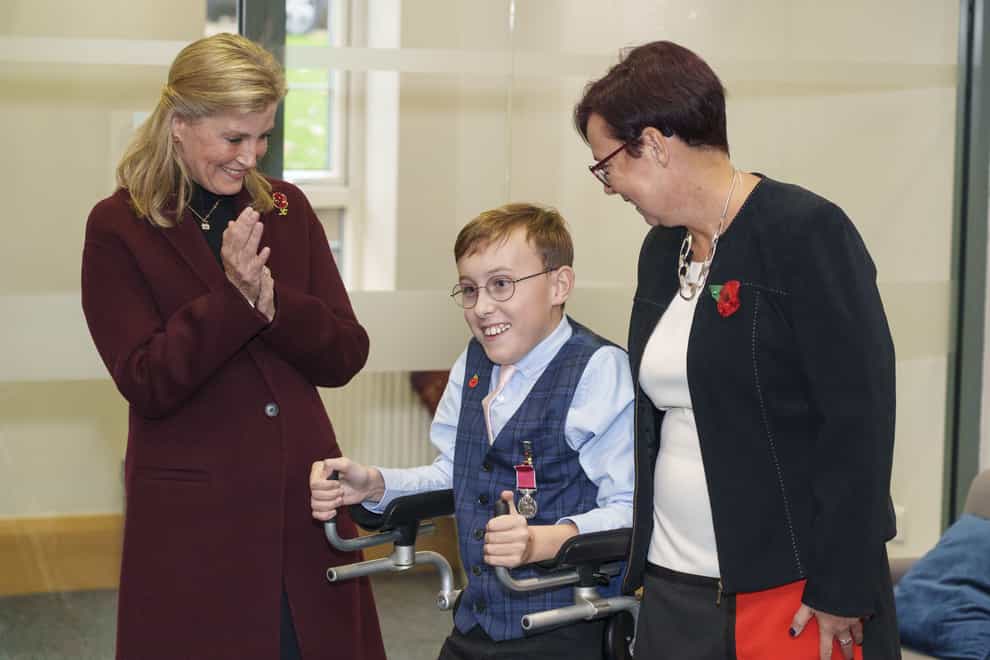 Tobias Weller with his mother Ruth Garbutt and the Countess of Wessex (Dominic Lipinski/PA)