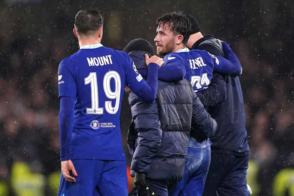 Chelsea’s Ben Chilwell (centre) is helped off the field by the medical staff during the match against Dinamo Zagreb (John Walton/PA).