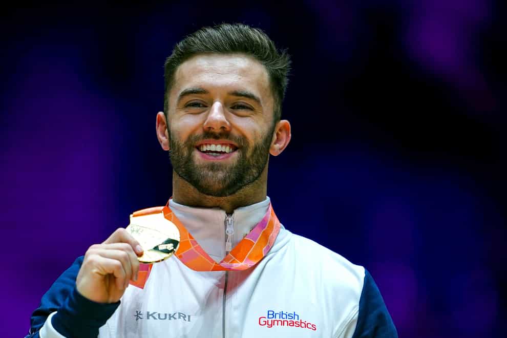 Great Britain’s Giarnni Regini-Moran celebrates with his gold medal (Peter Byrne/PA).