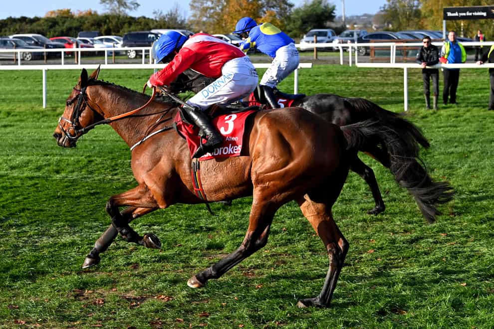 Envoi Allen ridden by jockey Rachael Blackmore (red silks) on their way to winning the Ladbrokes Champion Chase during day two of the Ladbrokes Festival of Racing at Down Royal Racecourse, Lisburn. Picture date: Saturday November 5, 2022.