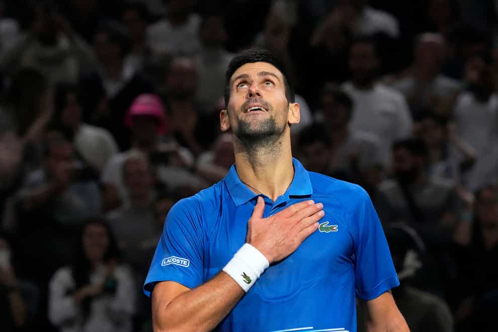 Novak Djokovic beat Stefanos Tsitsipas in three sets (Michel Euler/AP)