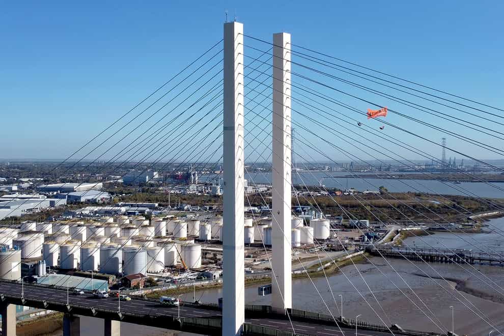 Two activists scaled the Queen Elizabeth II Bridge at the Dartford Crossing on the M25 in October (Just Stop Oil/PA)