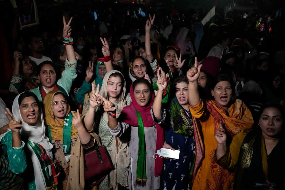 Supporters of former Pakistani Prime Minister Imran Khan’s party protest after Khan narrowly escaped an assassination attempt on his life (KM.Chaudary/AP )