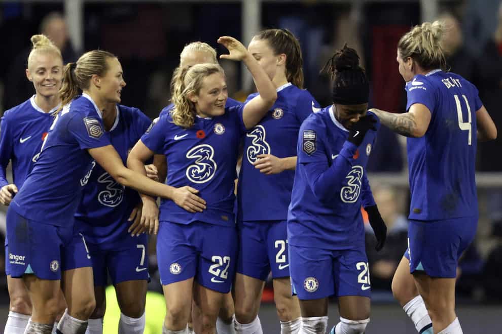 Erin Cuthbert is mobbed after her late goal for Chelsea (Richard Sellers/PA)