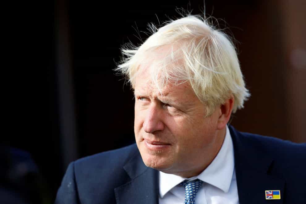 Boris Johnson will issue a rallying call to not to allow “defeatism” in the face of the worsening economic situation to undermine the fight against global warming (PA)