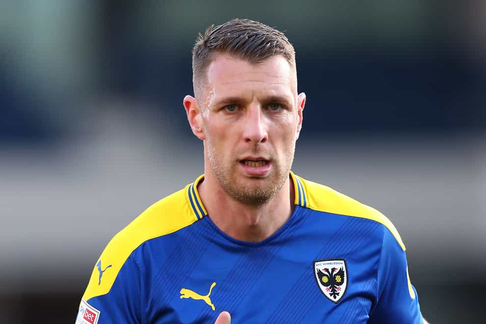AFC Wimbledon’s Lee Brown remains sidelined ahead of the visit of Leyton Orient. (Jacques Feeney/PA)