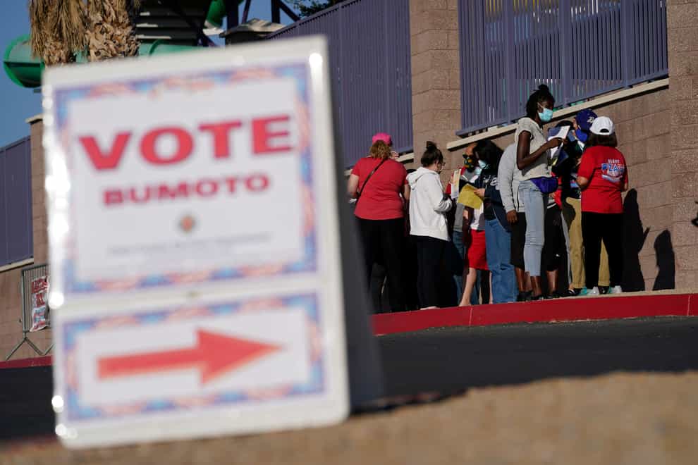 Americans have begun casting votes (John Locher/AP)