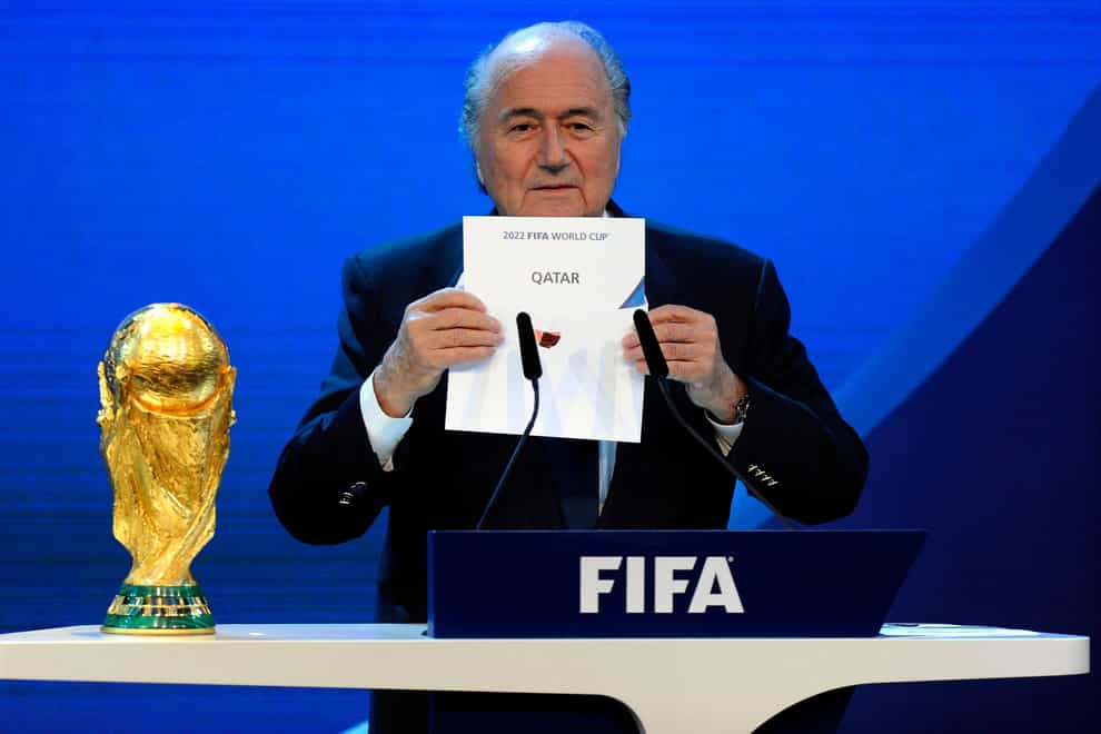 Then Fifa president Sepp Blatter announces that Qatar will be hosting the 2022 World Cup Keystone/Walter Bieri/AP)
