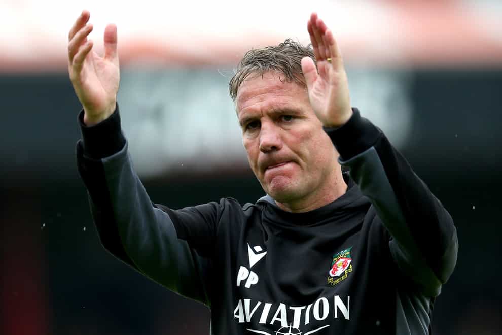 Phil Parkinson’s Wrexham are top of the National League (Nigel French/PA).