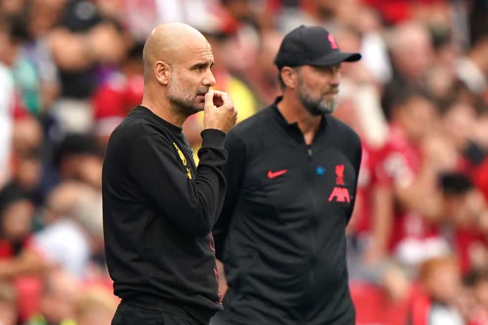 Manchester City manager Pep Guardiola (left) and Liverpool boss Jurgen Klopp will meet again in the Carabao Cup fourth round (Joe Giddens/PA)