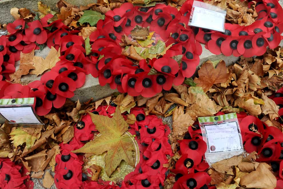 Several wreaths were placed during the 2 minute silence (Anthony Devlin/PA)