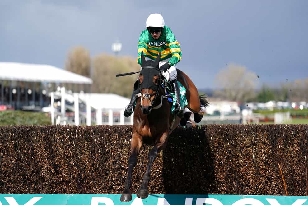 Gentleman De Mee ridden by Mark Walsh on their way to winning the Poundland Maghull Novices’ Chase during Grand National Day of the Randox Health Grand National Festival 2022 at Aintree Racecourse, Liverpool. Picture date: Saturday April 9, 2022.