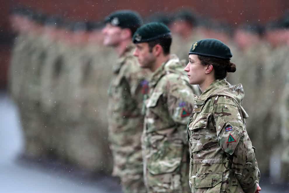 Members of 4th Battalion The Rifles line up for inspection at Normandy Barracks, Aldershot (Andrew Matthews/PA)
