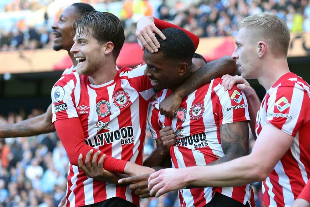 Ivan Toney (centre) scored both goals as Brentford claimed a stunning win at Manchester City (Nigel French/PA)