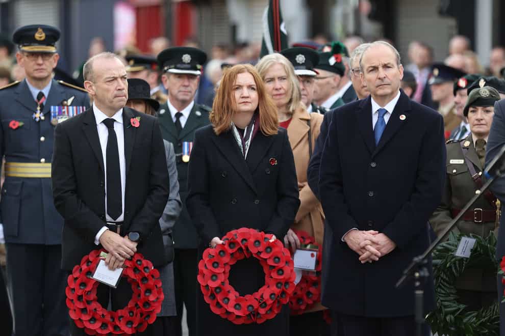 Northern Ireland Secretary Chris Heaton-Harris, left to right, head of the Northern Ireland Civil Service Jayne Brady and Taoiseach Michael Martin attended the Remembrance Sunday service at the cenotaph in Enniskillen (Liam McBurney/PA)