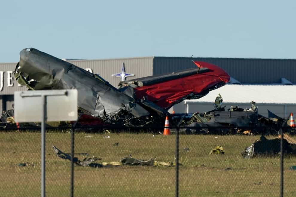 Debris from the two planes following the crash at Dallas Executive Airport (LM Otero/AP)